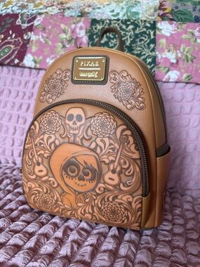 Loungefly Tan & Brown Coco Embossed Mini Backpack